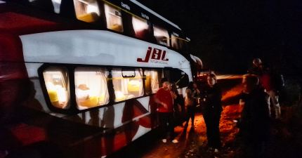 JBL bus stopped on the road